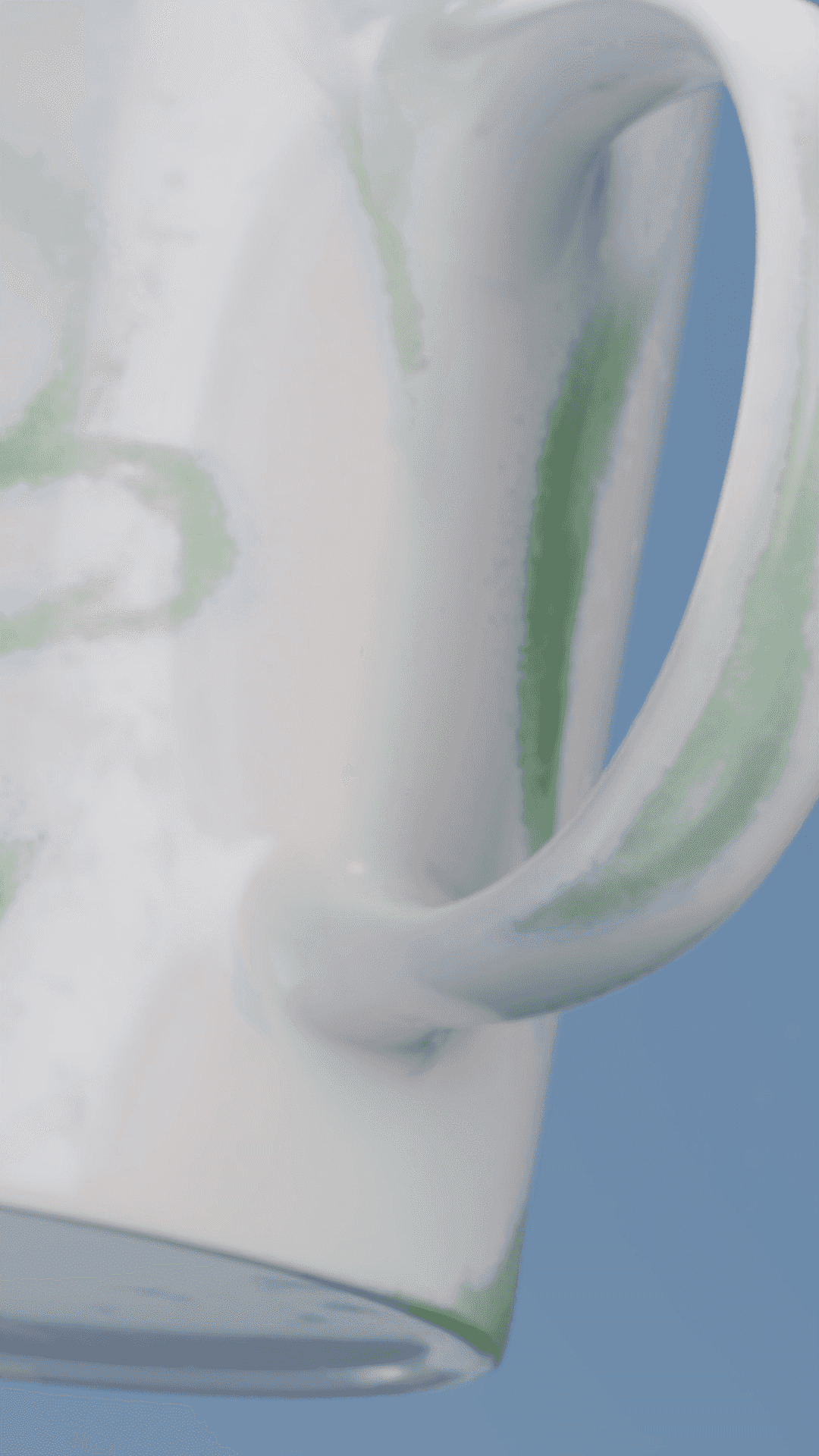 Cafe Kitsune - A kitsune cup in the air with green pattern