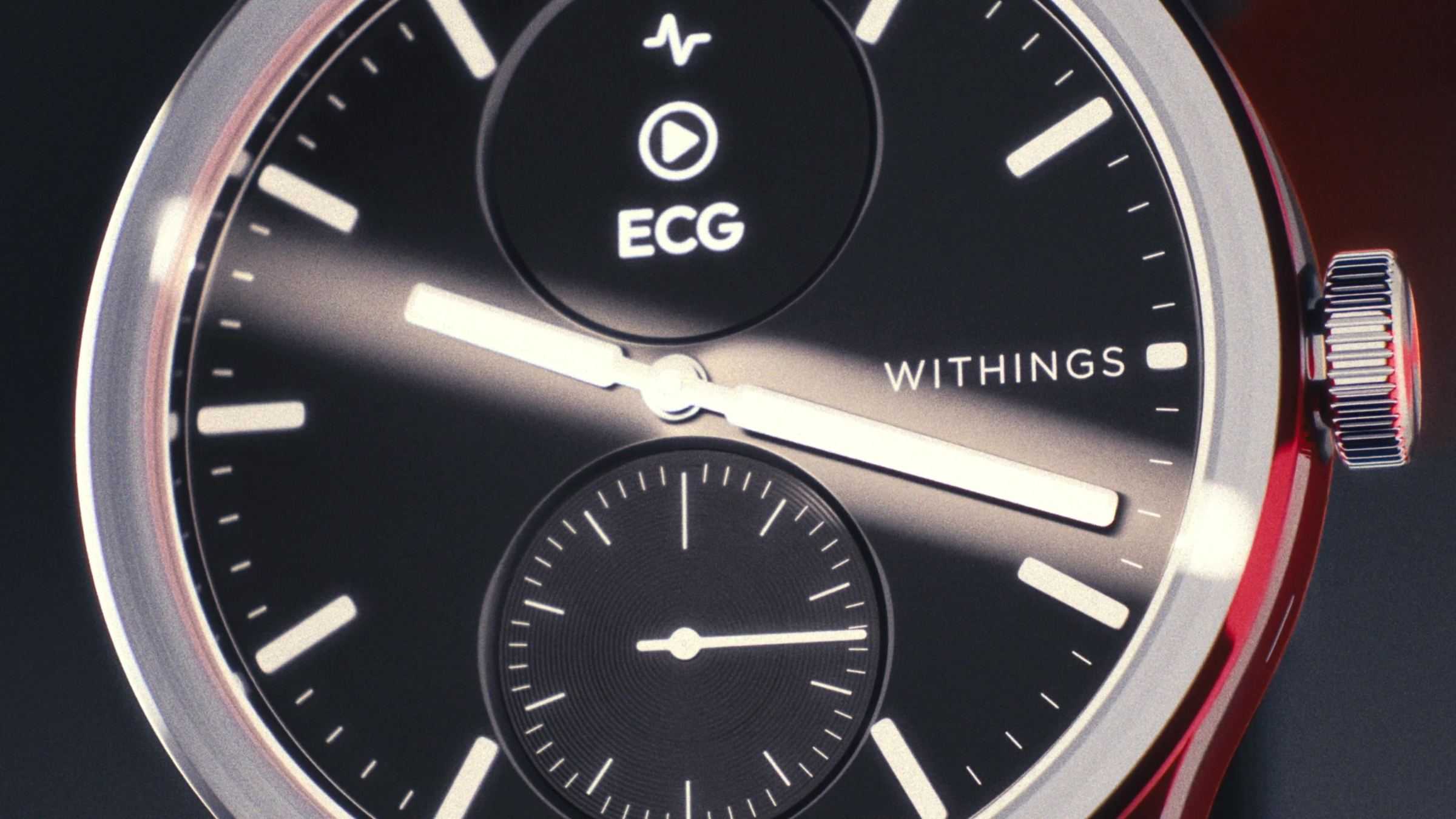 The black dial of the Withings watch seen at an angle, under a light reflection