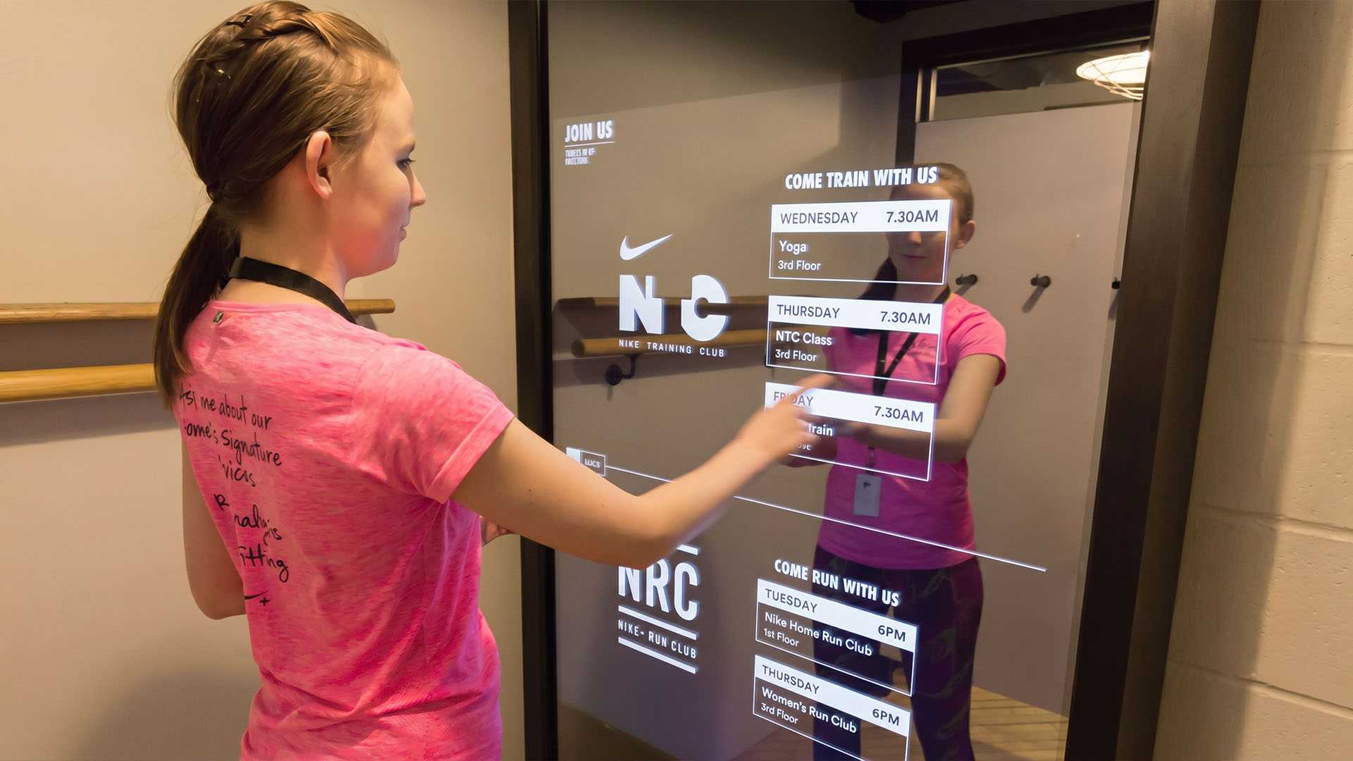 Digital interactive smart mirror in Nike store, touch screen.